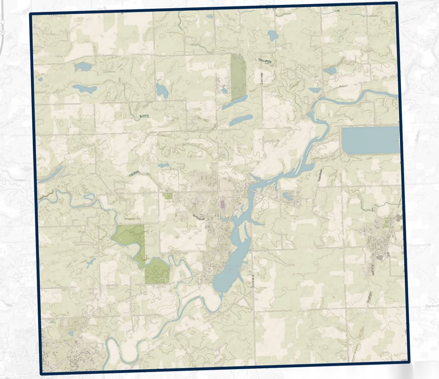 Map of Cedar Creek Township outlined in navy, with its roads and rivers shown as lines and no names.